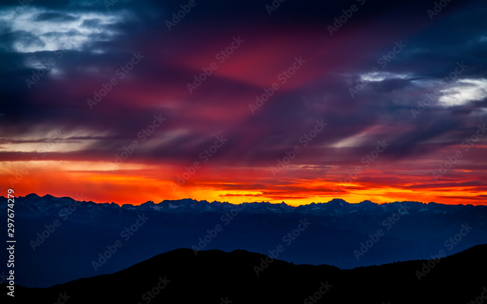 dark sunset over mountain range