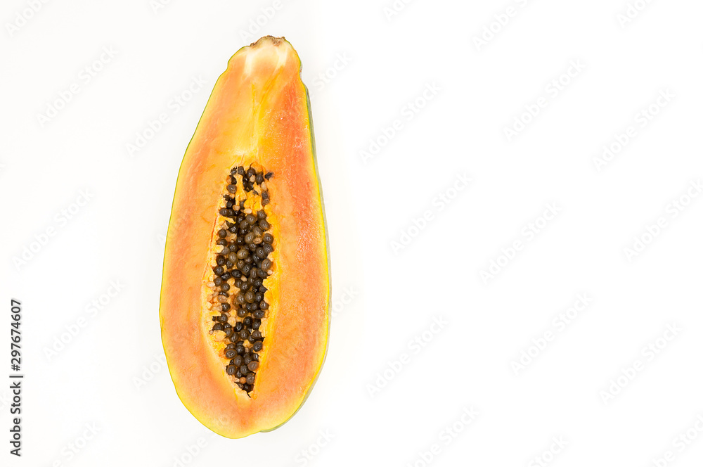 Fresh half papaya on isolated on background - space for text Fresh half papaya on isolated on background - space for text