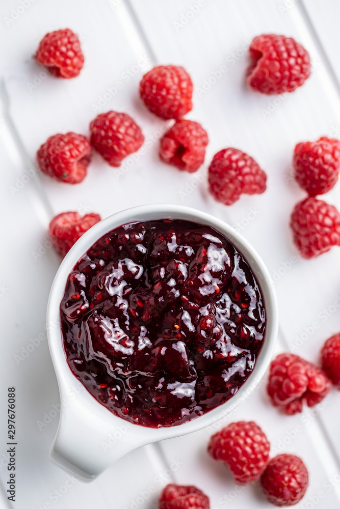 Sweet raspberry jam and raspberries. Sweet raspberry jam and raspberries.