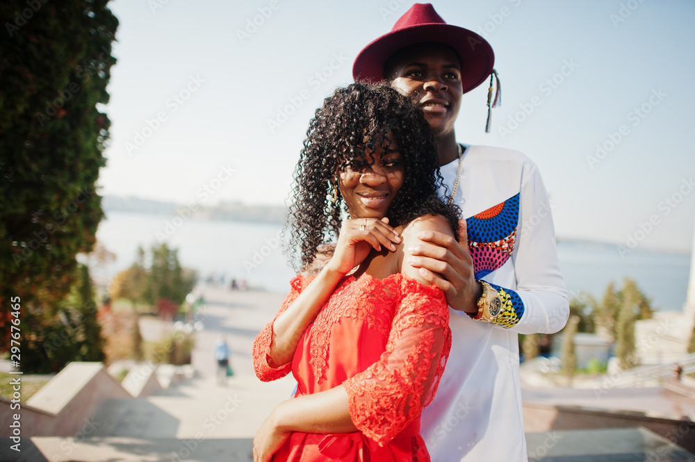 Obraz premium Stylish trendy afro france couple posed together at autumn day. Black african models in love.