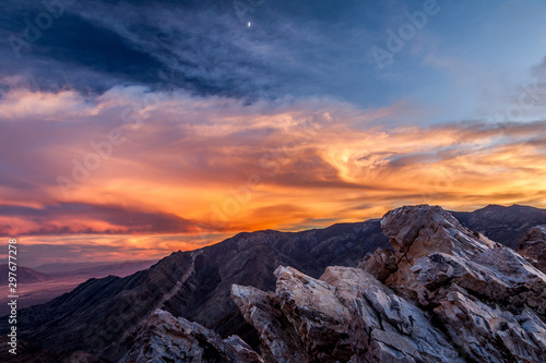 dramatic sunset from mountain peak © Scott Bufkin