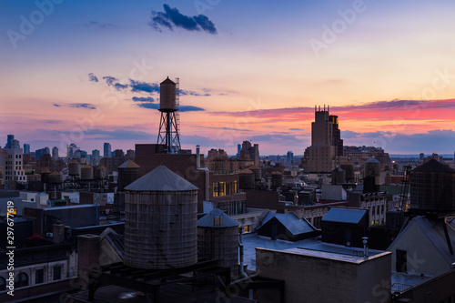 Canvas Print Chelsea rooftops at twilight with water towers