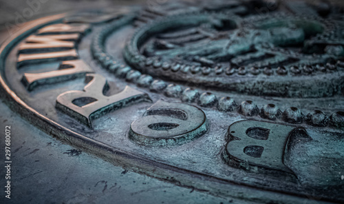Photography Germany, Berlin - August 23, 2019: Metal textured city nameplate.