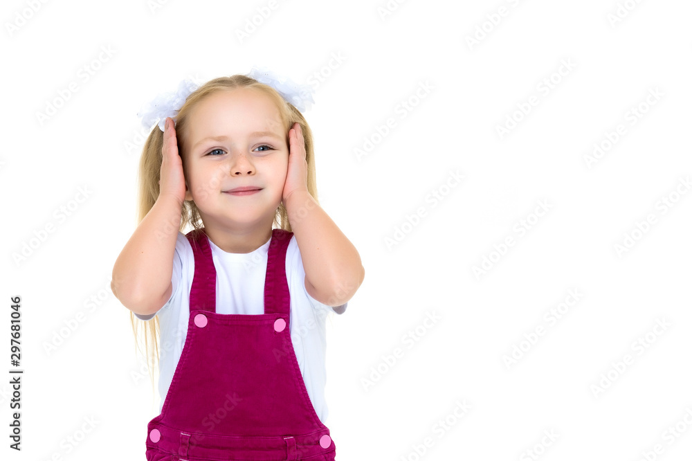 Little girl posing in studio on a white background. Little girl posing in studio on a white background.