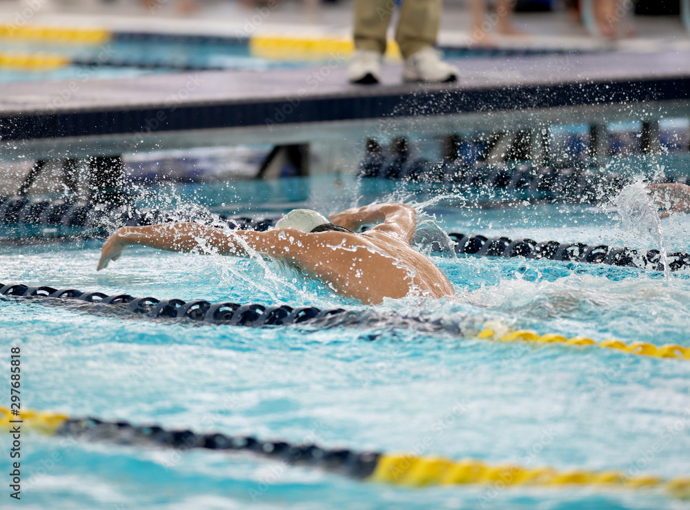 Swimmers competing at a swimming meet at a competition in South Texas