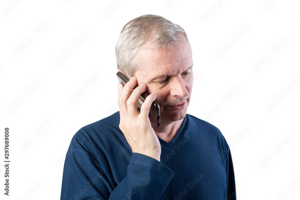 An elderly man talking on a smartphone. Isolated on a white background. An elderly man talking on a smartphone. Isolated on a white background.