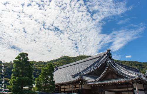 Cloudy sky over temple building in Kyoto Japan