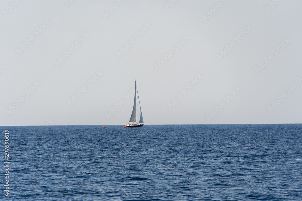 yacht sailing in the mediterranean sea on a sunny day