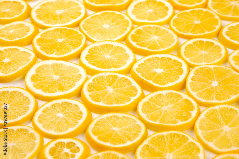 Obraz premium sliced citrus lemons half on a light background
