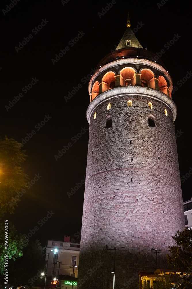 Naklejka premium The illuminated Galata Tower at night