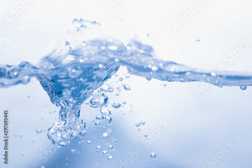 blue water splash and drop for drinking, abstract water pure and freshness concept background 