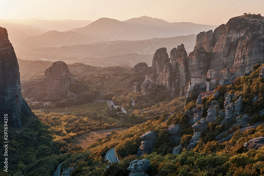 landscape image of Meteora greece with Roussanou Monastery  at sunset