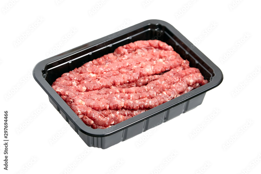 Ground beef in a black plastic tray isolated on white background. Uncooked mincemeat. Forcemeat, fresh raw minced meat Ground beef in a black plastic tray isolated on white background. Uncooked mincemeat. Forcemeat, fresh raw minced meat