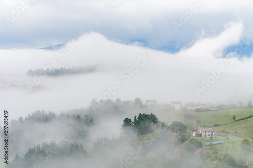 foggy morning at basque countryside
