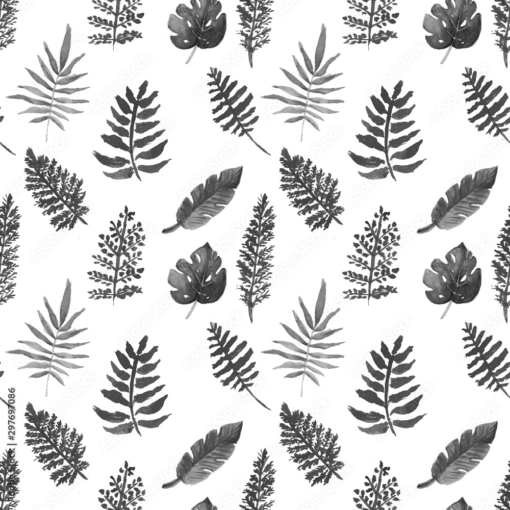 Seamless pattern with watercolor leaves of tropical plants.