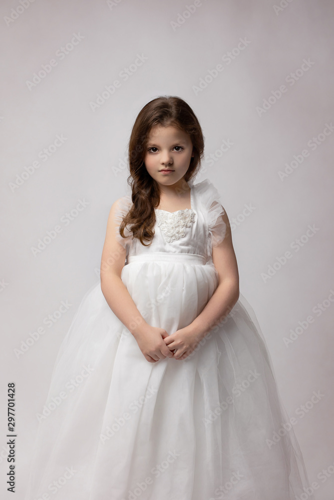 Beautiful Young Brunette Girl in White Gown Beautiful Young Brunette Girl in White Gown