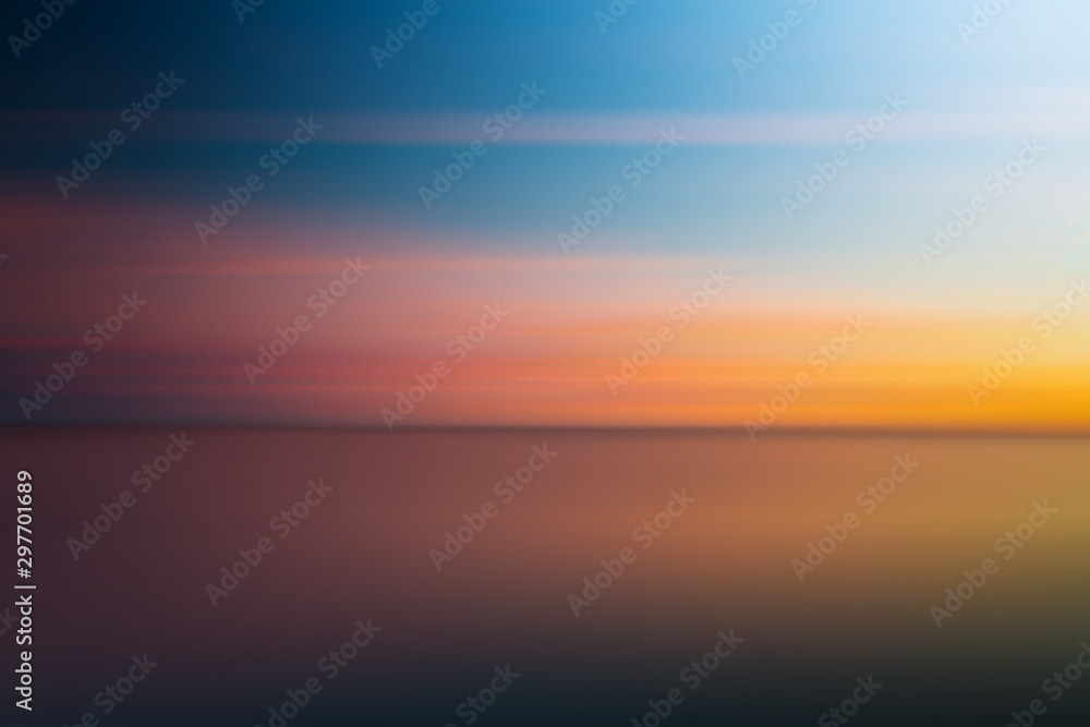 Obraz premium Abstract blurry dramatic Sunset in Long Exposure for background