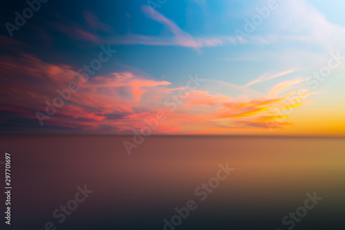 Abstract blurry dramatic Sunset in Long Exposure for background