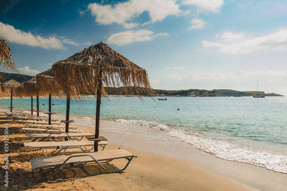 beach with chairs and umbrellas beach with chairs and umbrellas