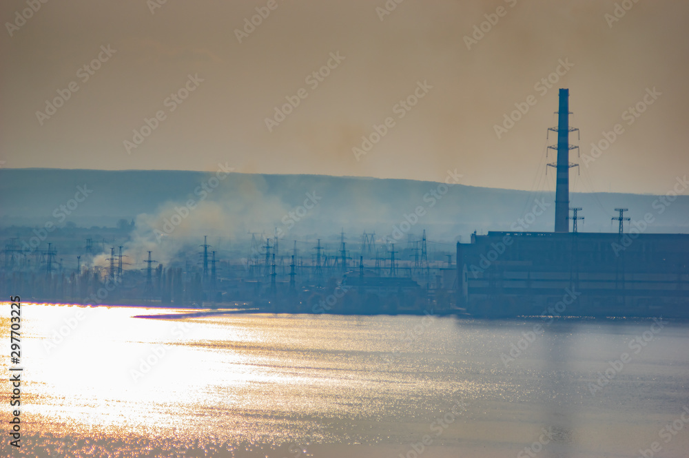 Thermal power station ashore in haze