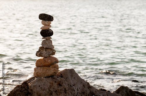 A Cairn, a ceremonial stack of rocks on a rocky sore on a Gulf Coast Florida beach.