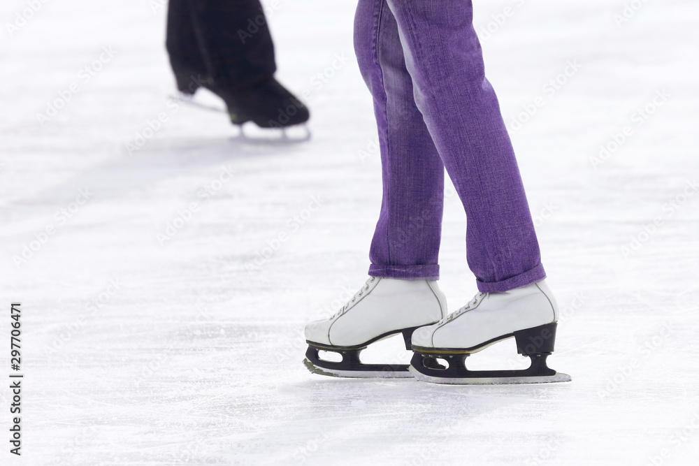 feet skating on the ice rink. Sport and entertainment. Rest and winter holidays. feet skating on the ice rink. Sport and entertainment. Rest and winter holidays.