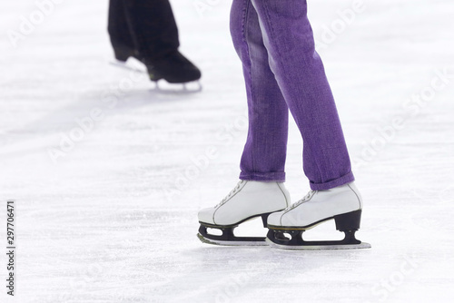 feet skating on the ice rink. Sport and entertainment. Rest and winter holidays.