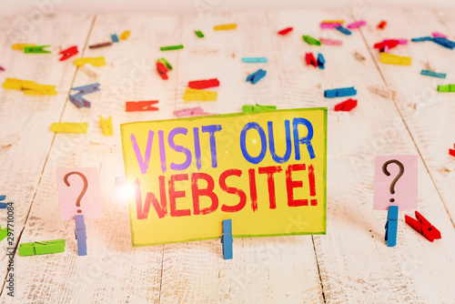 Text sign showing Visit Our Website. Business photo text visitor who arrives at web site and proceeds to browse Scribbled and crumbling sheet with paper clips placed on the wooden table