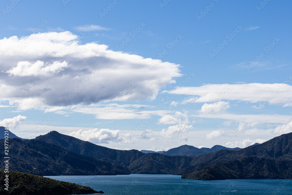 beautiful mountain range blue sea and cloudy sky in nature