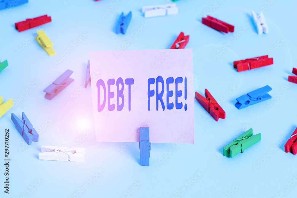 Text sign showing Debt Free. Business photo showcasing does not owning any money to any individual or companies Colored clothespin papers empty reminder blue floor background office pin Text sign showing Debt Free. Business photo showcasing does not owning any money to any individual or companies Colored clothespin papers empty reminder blue floor background office pin