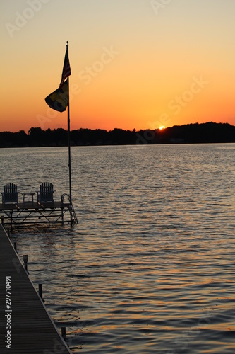 lake sunset with flags
