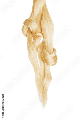 Three knots of blond hair isolated on white background. Long ponytail