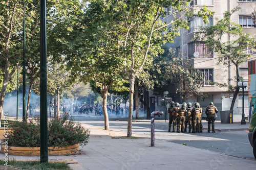 Police holding against the protesters