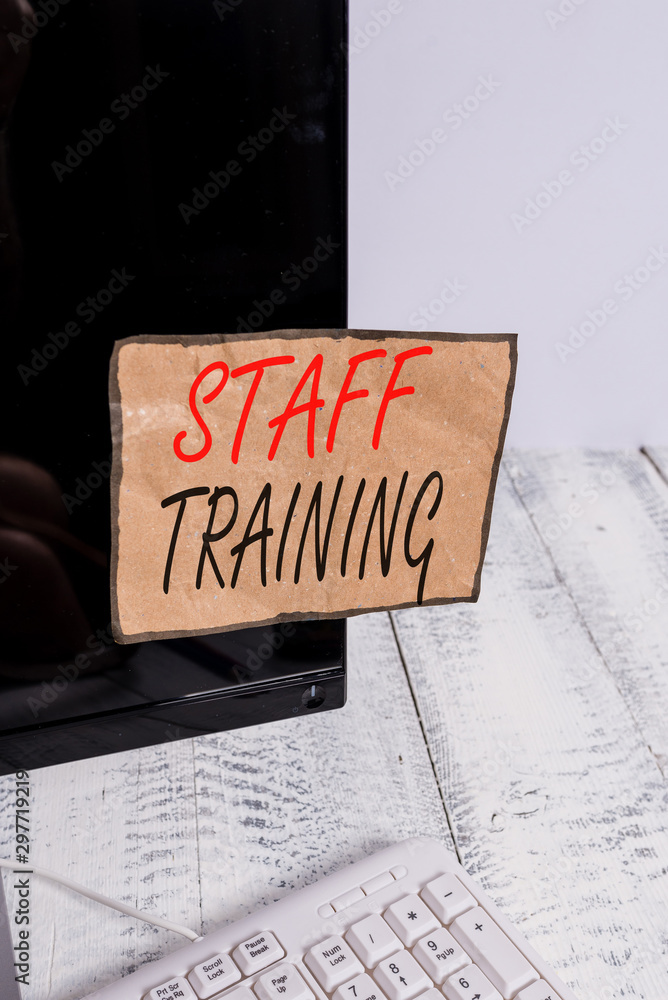 Writing note showing Staff Training. Business concept for program that helps employees learn specific knowledge Notation paper computer monitor screen near white keyboard Writing note showing Staff Training. Business concept for program that helps employees learn specific knowledge Notation paper computer monitor screen near white keyboard