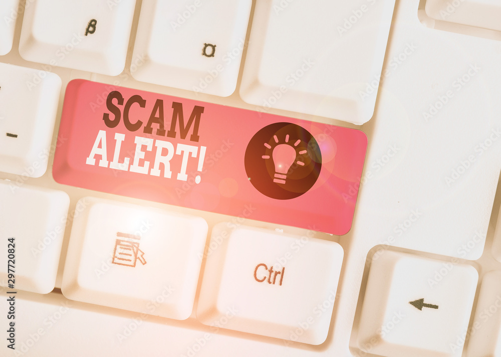 Word writing text Scam Alert. Business photo showcasing fraudulently obtain money from victim by persuading him White pc keyboard with empty note paper above white background key copy space Word writing text Scam Alert. Business photo showcasing fraudulently obtain money from victim by persuading him White pc keyboard with empty note paper above white background key copy space