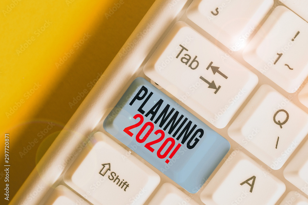 Obraz premium Word writing text Planning 2020. Business photo showcasing process of making plans for something next year White pc keyboard with empty note paper above white background key copy space