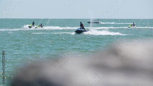 Hanging on Jet Skis in Ocean