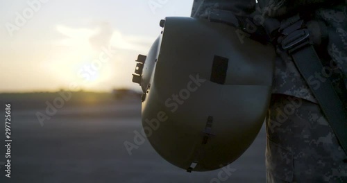 slow motion army helmet at sunrise
