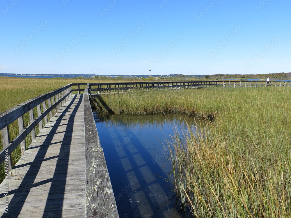 A Boardwalk Through the Marsh on Shinnecock Bay in Southampton, Long Island, NY.