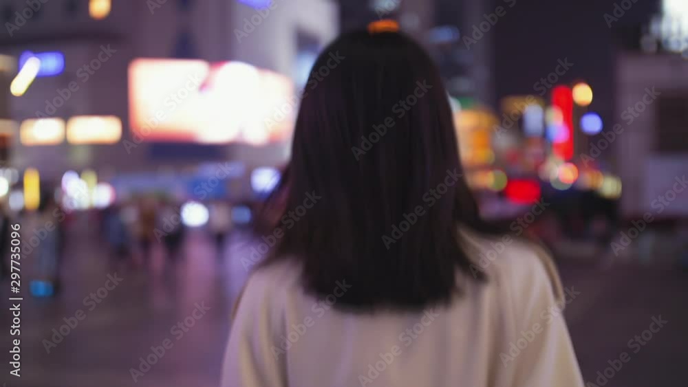 pretty happy young Asian woman in the urban street looking at camera in slow motion Chinese lovely girlfriend pretty happy young Asian woman in the urban street looking at camera in slow motion Chinese lovely girlfriend