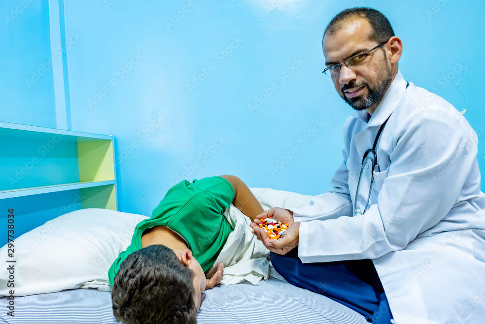 Doctor giving his patient some medicine Doctor giving his patient some medicine