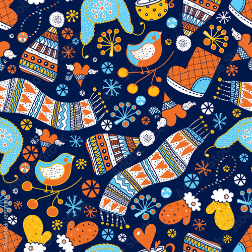 Winter cozy seamless pattern with warm clothes, snowflakes, tea and birds.