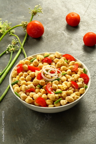 Bowl of healthy appetizer salad with organic chickpeas 
