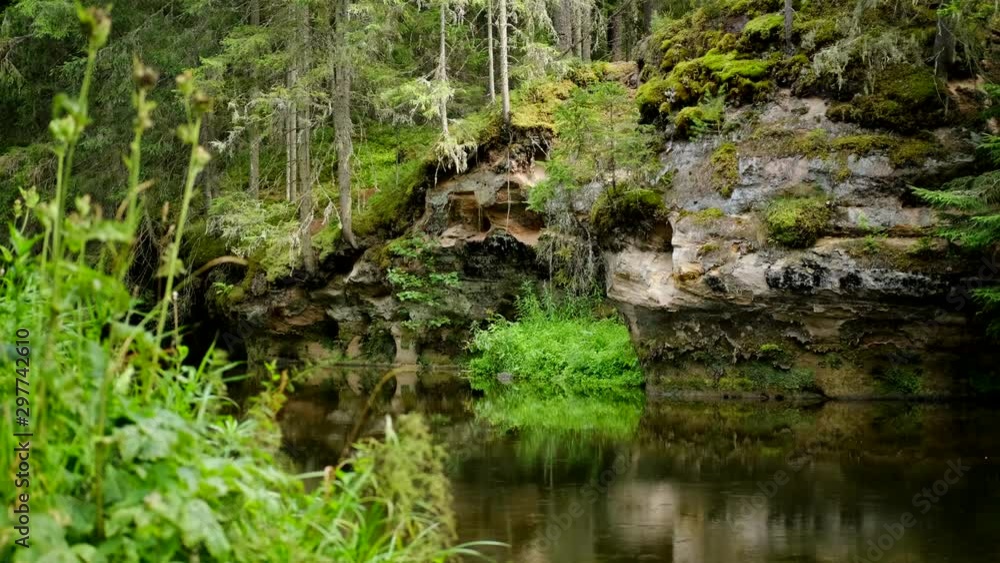 Beautiful river in a sandstone canyon covered with forest in a national park. Taevaskoja or Heaven’s Hall is considered one of the most popular natural sights in Estonia. Beautiful river in a sandstone canyon covered with forest in a national park. Taevaskoja or Heaven’s Hall is considered one of the most popular natural sights in Estonia.