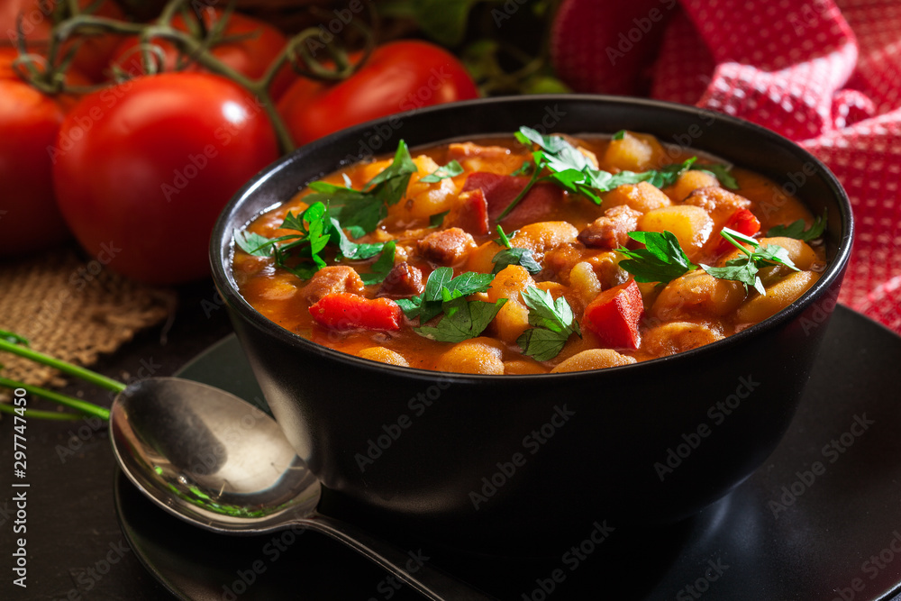 White bean soup with potatoes, tomatoes, paprika, and bacon White bean soup with potatoes, tomatoes, paprika, and bacon