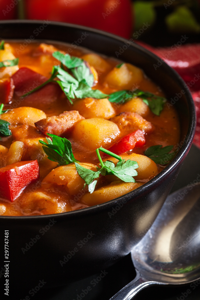 White bean soup with potatoes, tomatoes, paprika, and bacon White bean soup with potatoes, tomatoes, paprika, and bacon
