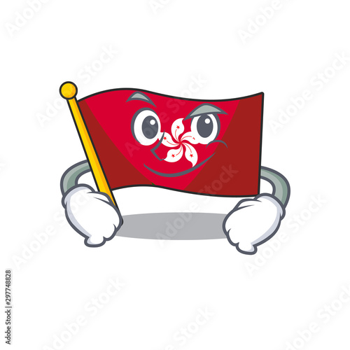 Smirking flag hongkong clings to mascot wall