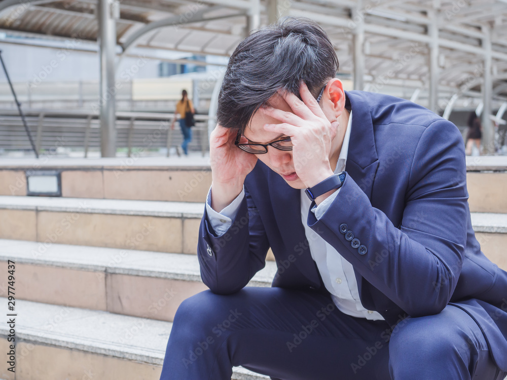 tired businessman are strained to work tired businessman are strained to work