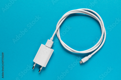 Cable phone chargers on blue background