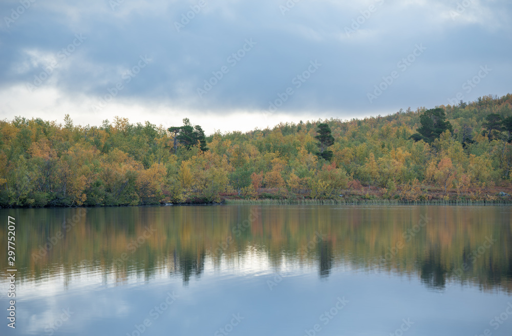 Lake in autumn. Abisko national park in north of Sweden. Lake in autumn. Abisko national park in north of Sweden.